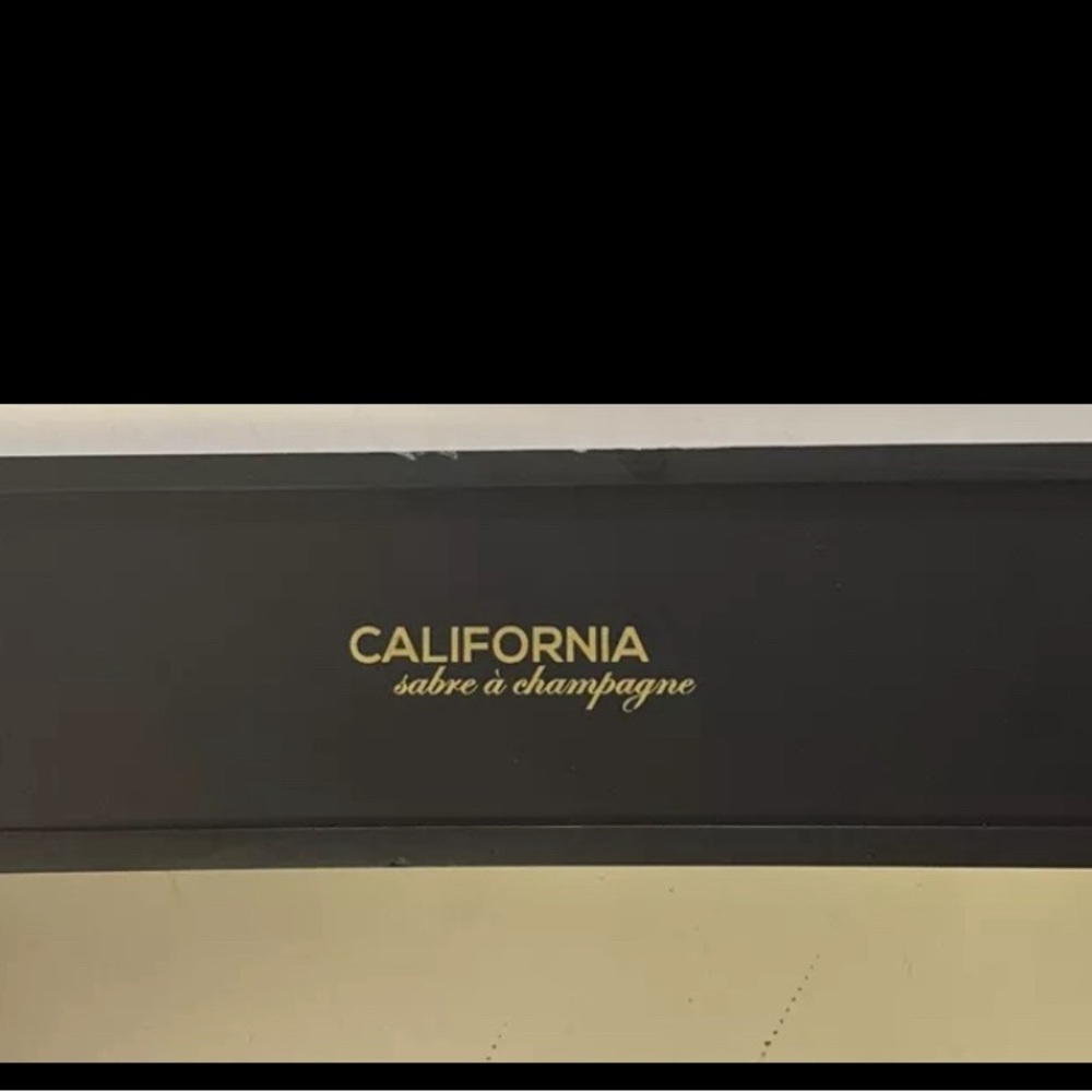 California Champagne Saber Company Marble Champagne Sabre Knife Bottle Opener.